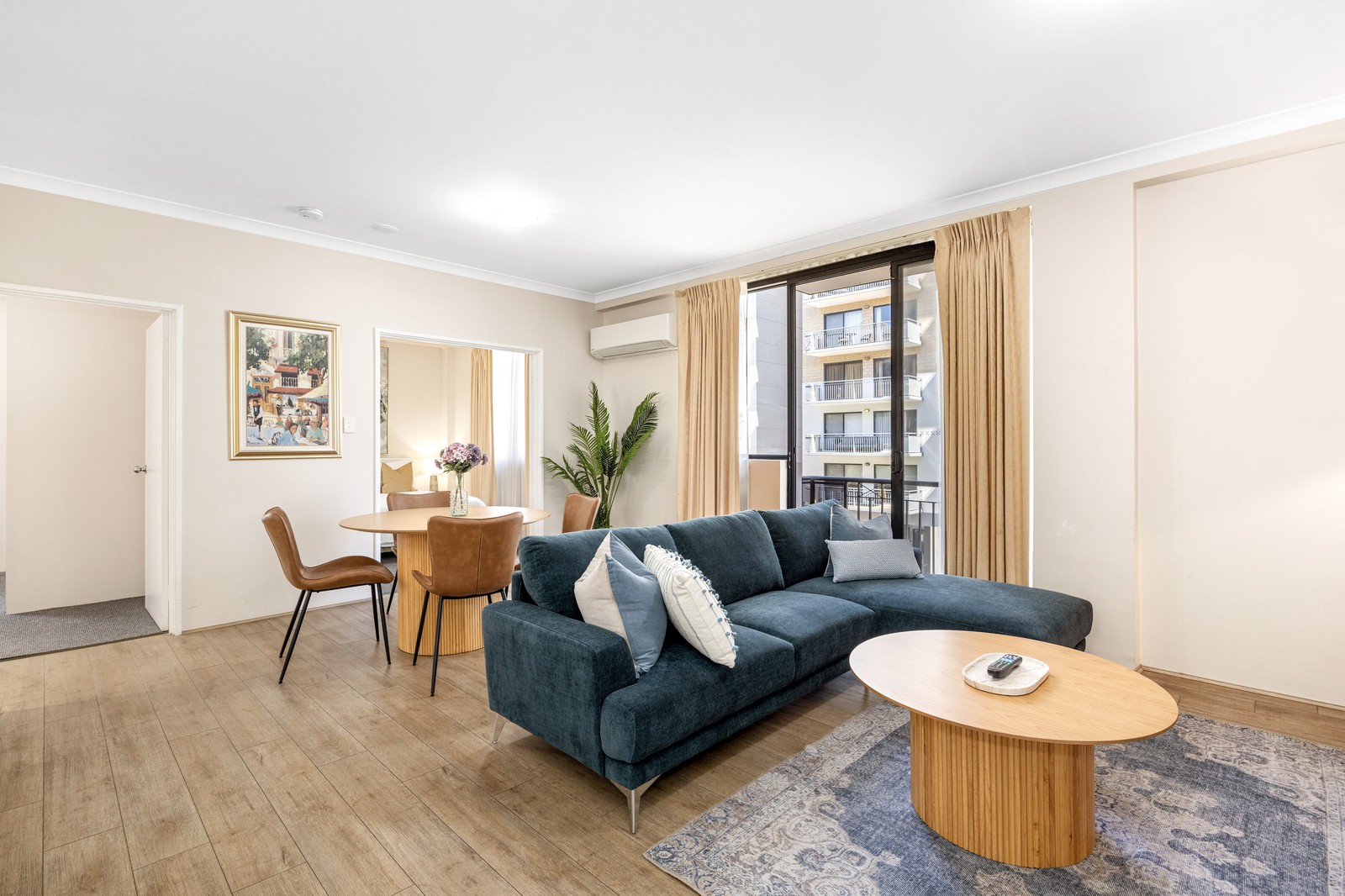 modern living room with sofa and dining area property styling perth | GPS: -31.668986, 116.399294